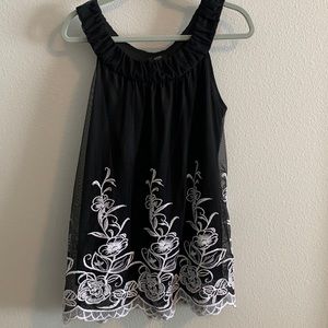 Black and white sleeveless top
